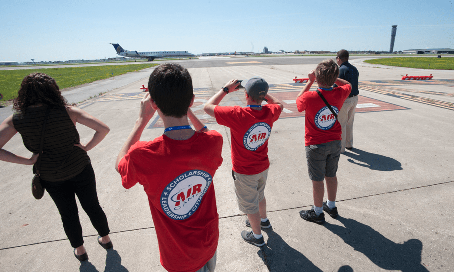 Students view an aircraft at Dayton International Airport in Dayton, Ohio